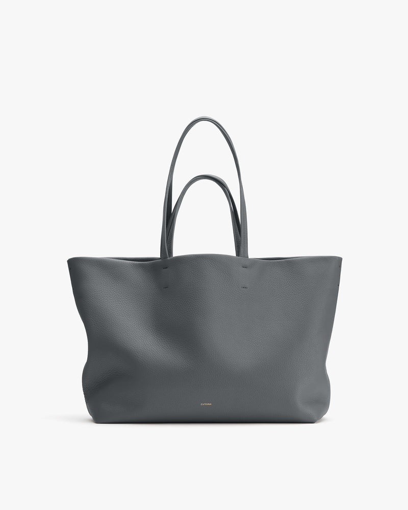 Large, plain tote bag with two handles.