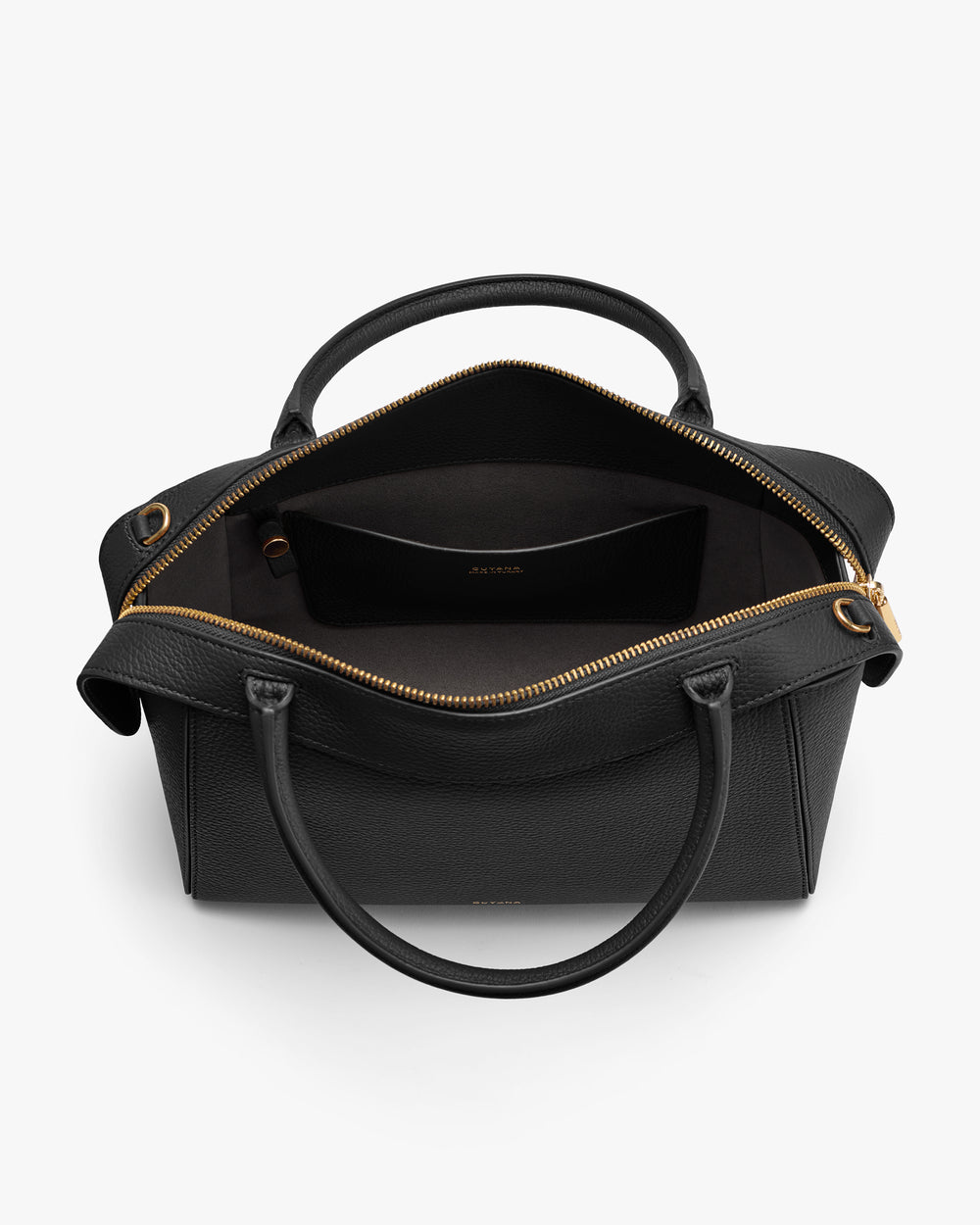 Open handbag with visible interior and a small pocket.