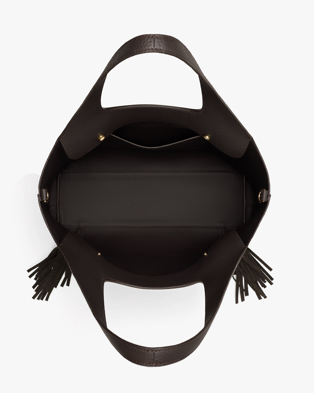 Open handbag with fringe on handles, viewed from above.