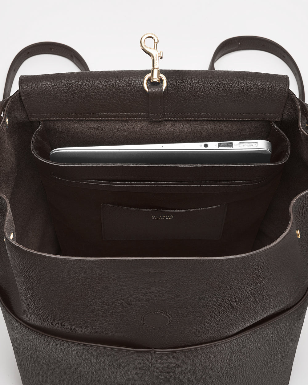 Open tote bag with laptop inside and a hook clasp at the top.