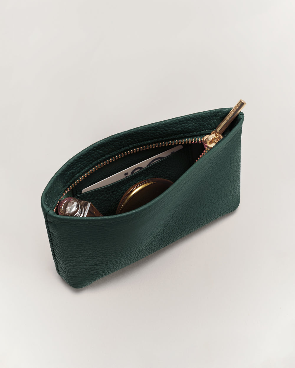 Small open pouch with zipper and various items inside