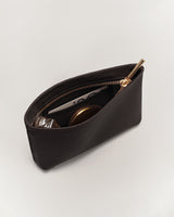 Open zipper pouch with items inside