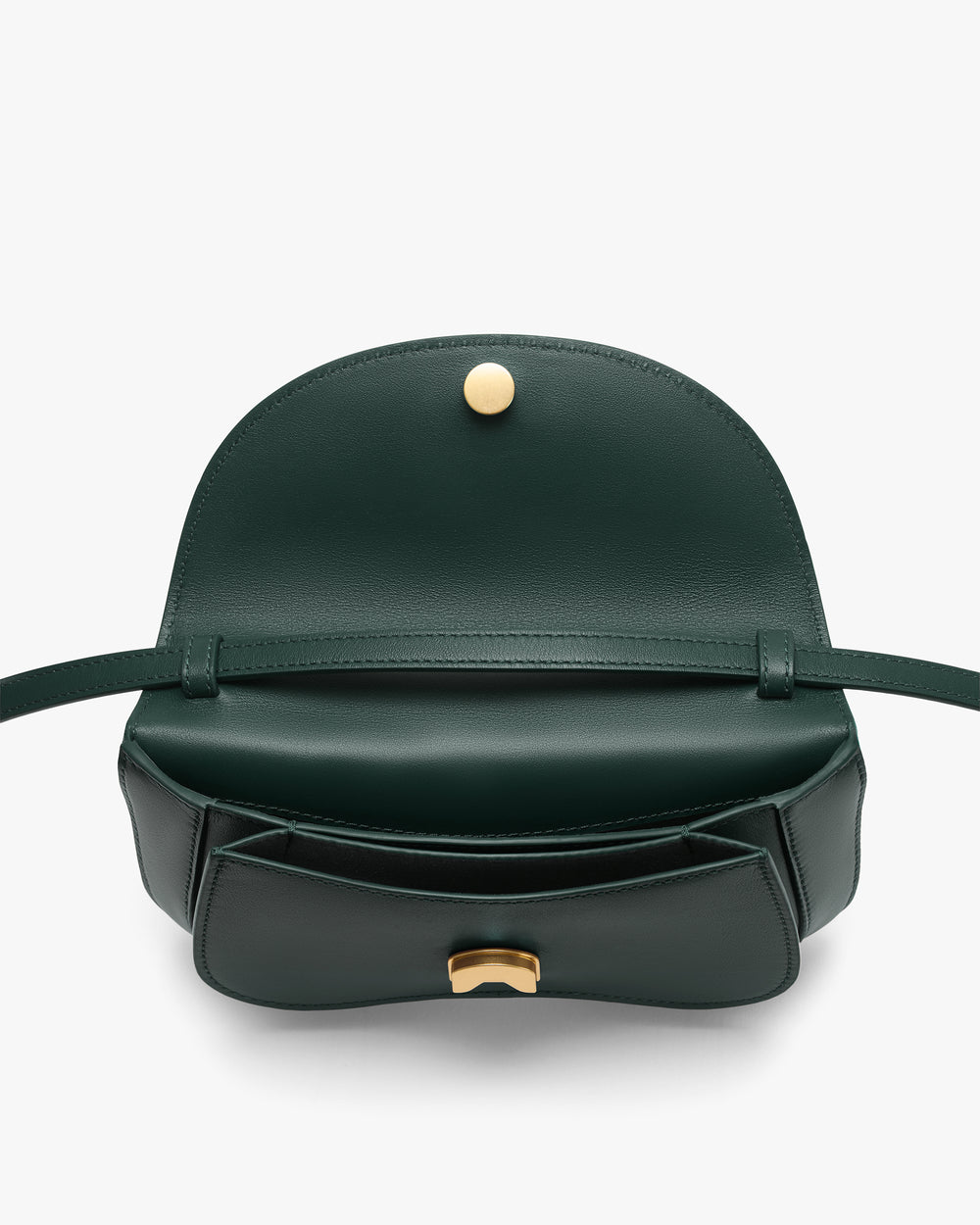 Open handbag with a flap and button closure, featuring interior compartments.