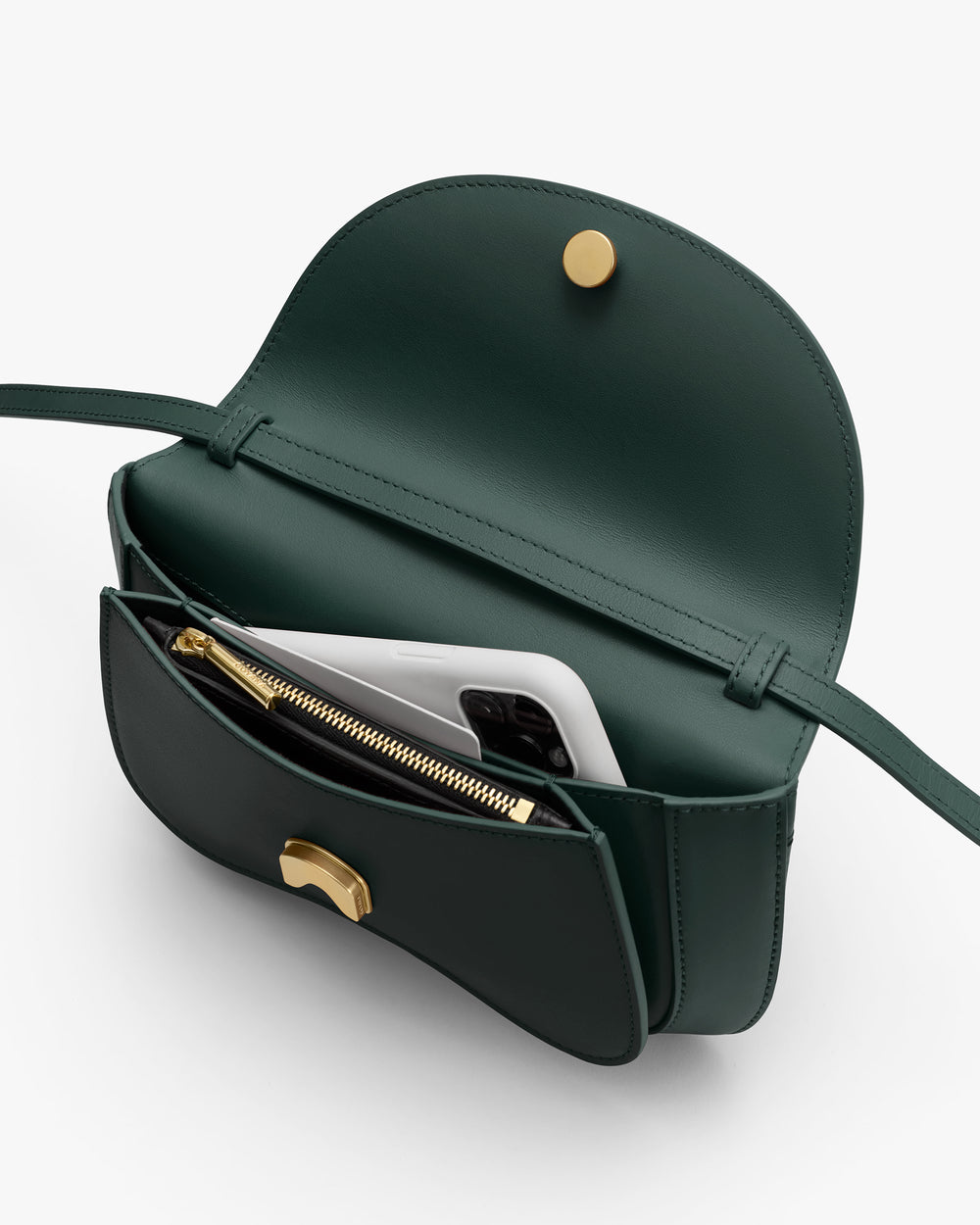 Open shoulder bag with phone and zipper pouch inside.