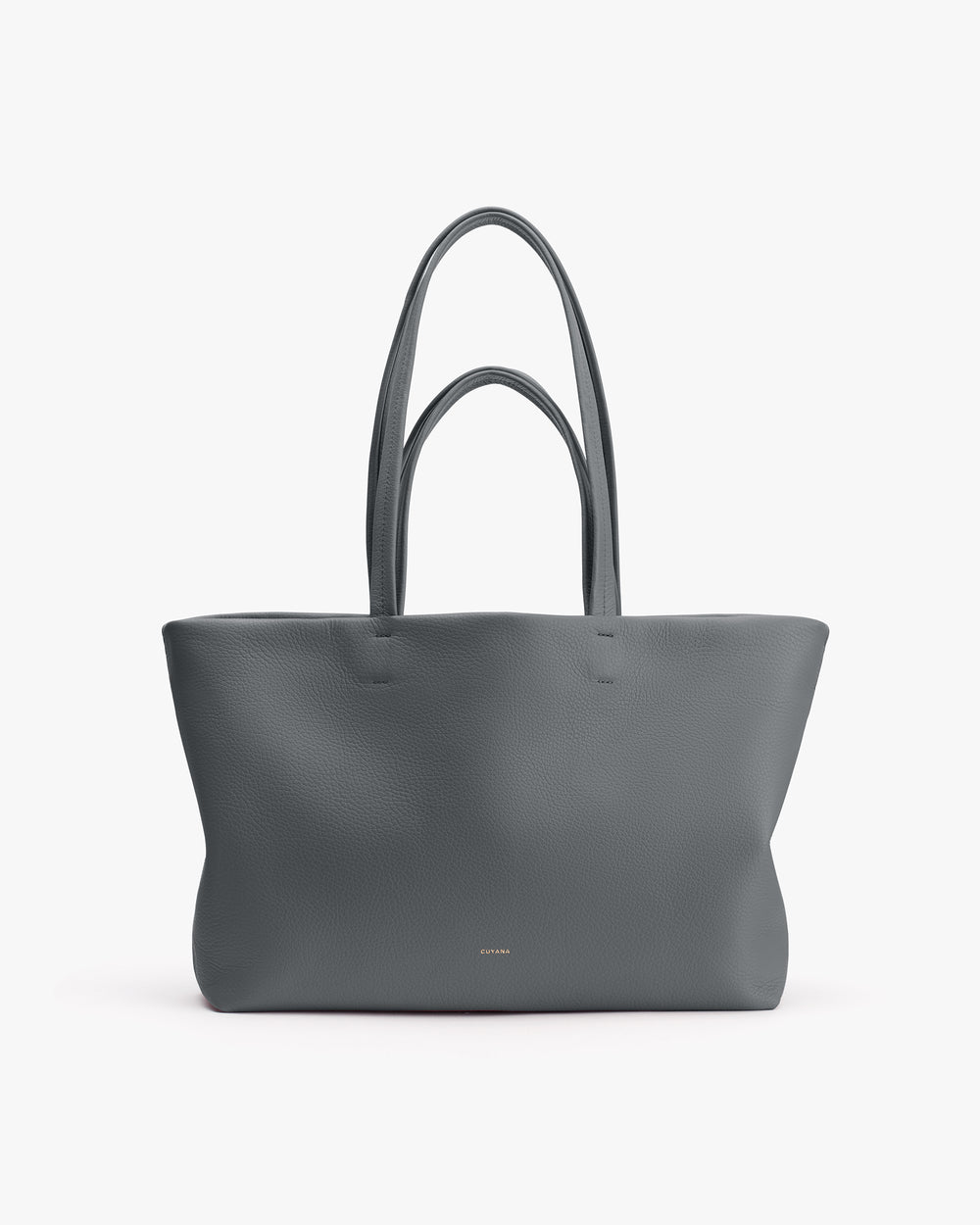 Large tote bag with long handles on plain background