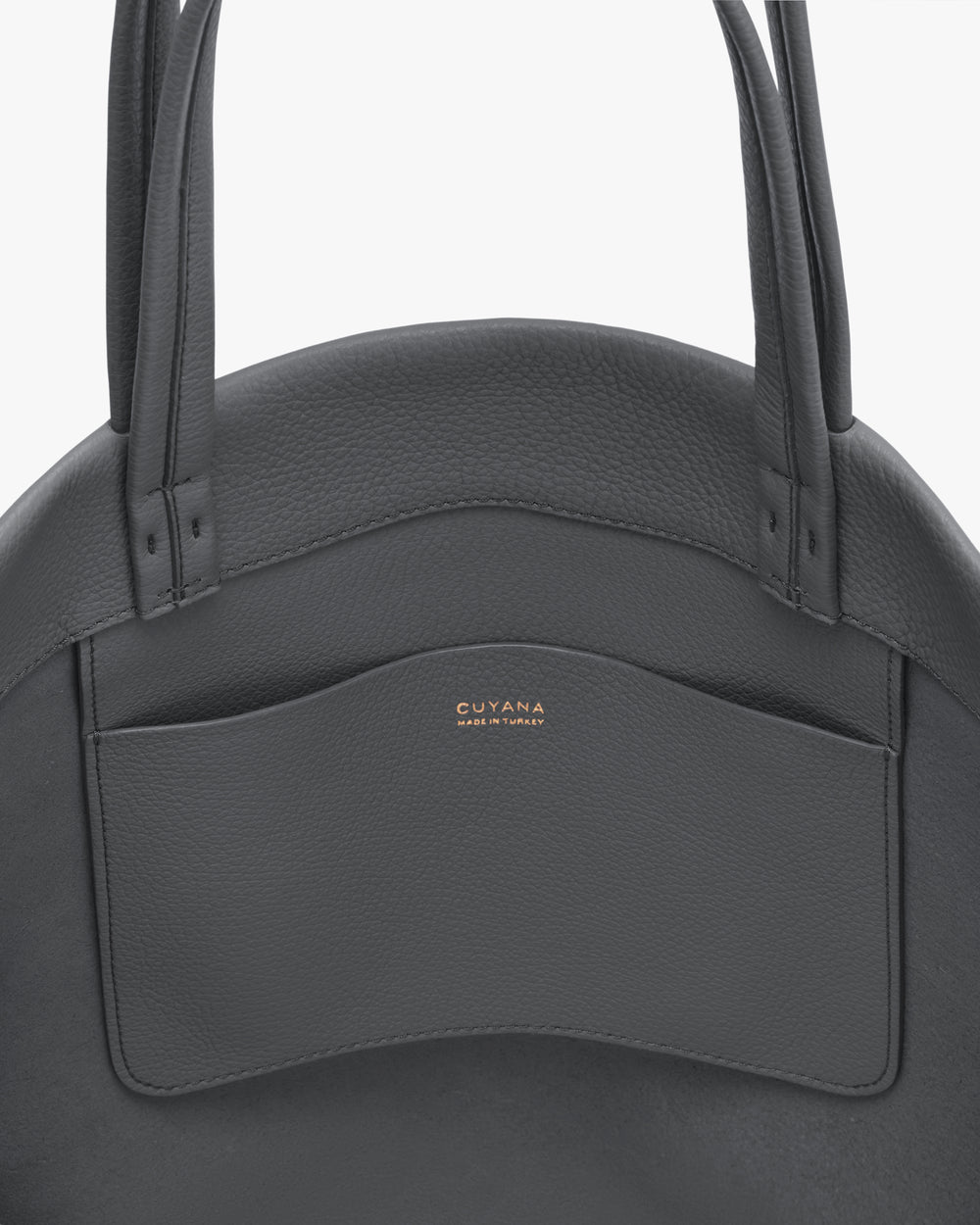 Round handbag with open external pocket and two handles