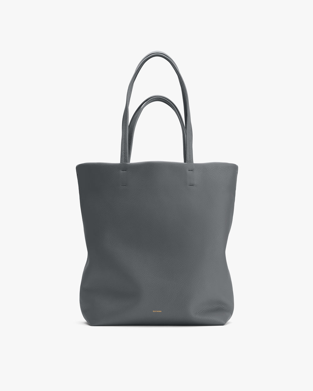 Tote bag with two handles on plain background.