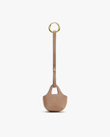 Small textured pouch with a long strap and circular ring attachment.