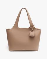 Tote bag with attached mini pouch and two handles.