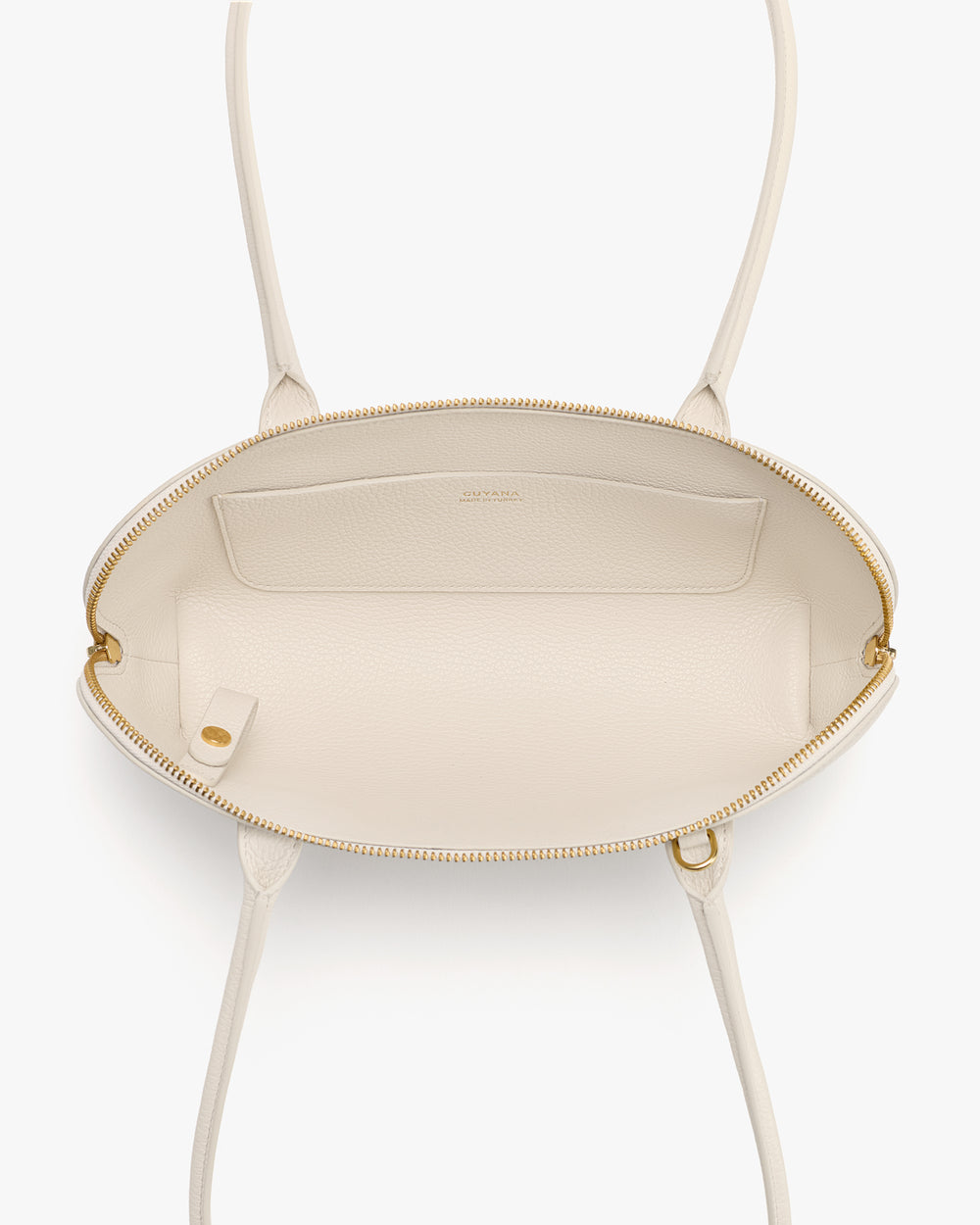 Open handbag showing interior pocket and zipper with handles on each side