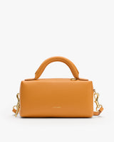 Structured handbag with top handle and detachable shoulder strap.