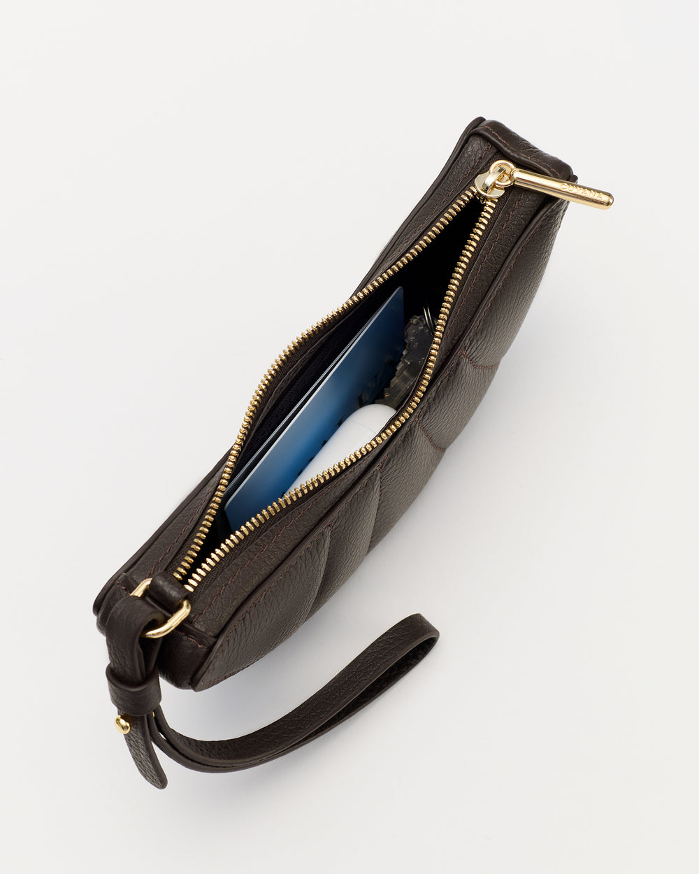 Small wristlet bag with open zipper showing contents.
