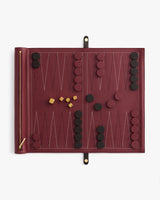 Backgammon set with rolled board showing arranged pieces and dice.
