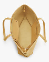 Open tote bag with an inner pocket and a zip closure.