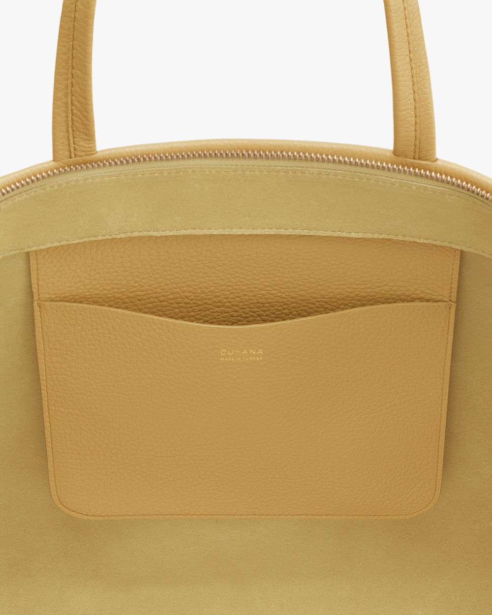 Close-up of a tote bag with an inner pocket and zipper.