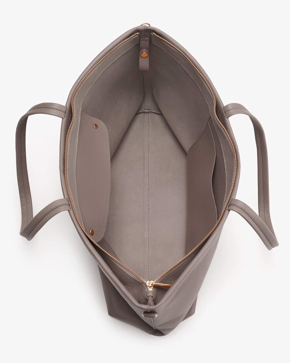 Open tote bag showing interior with zipper pocket and two handles.