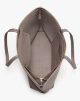 Open tote bag with a zippered compartment inside.