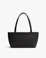 Handbag with two long straps and a simple design.