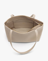 Open handbag with handles and inner pocket visible.