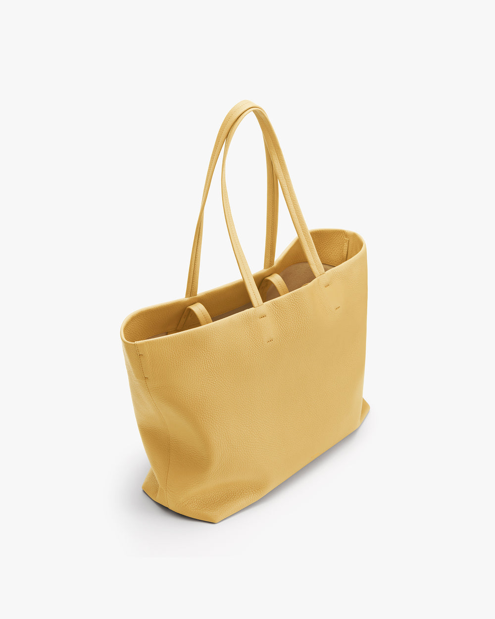 Tote bag with long handles on a white background.