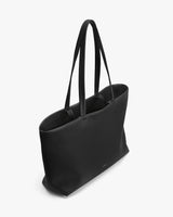 Large tote bag with long handles, seen from above.