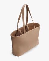 Tote bag with dual shoulder straps and an open top.