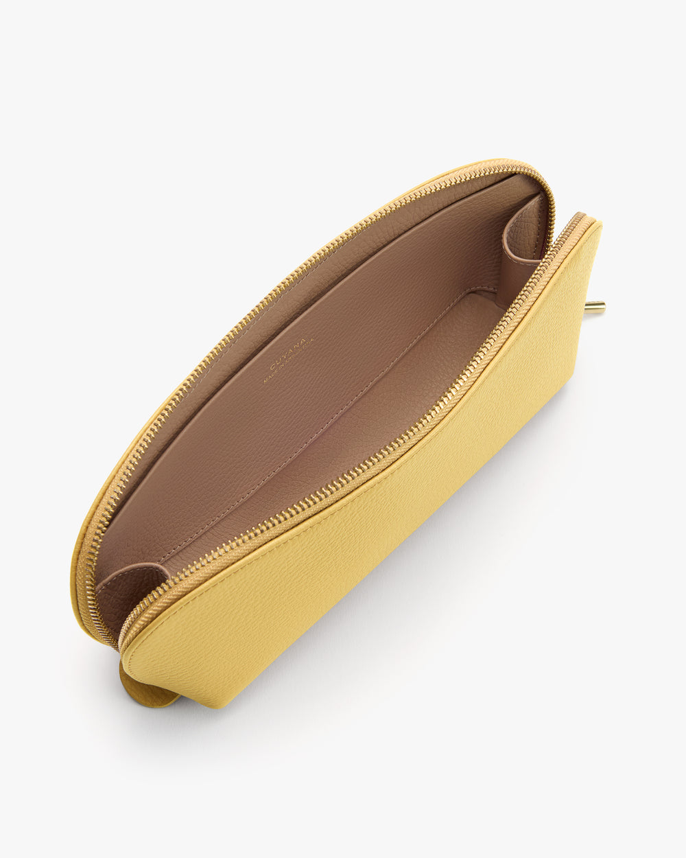 A top view of an open clutch bag with a zipper and spacious interior.