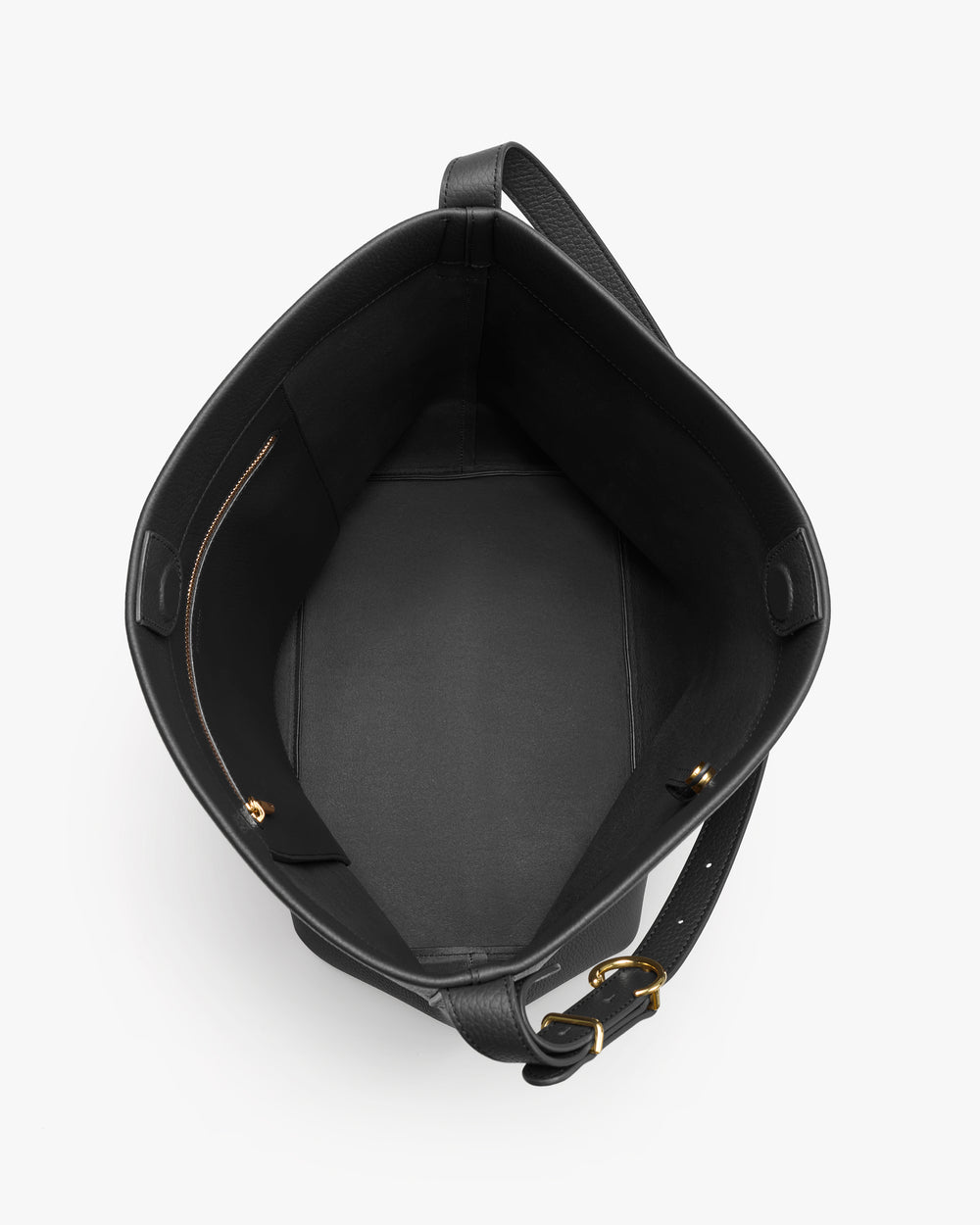 Open leather tote bag with a strap and interior pocket.