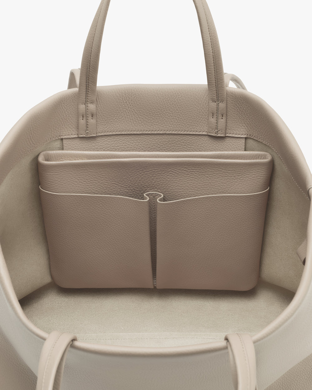 Inside view of an open tote bag with a pocket.