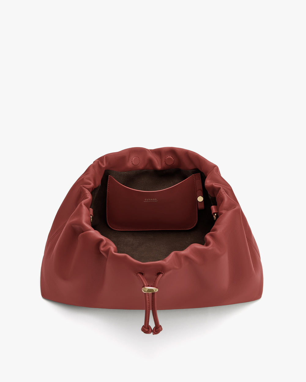 Open travel bag with interior pouch visible.