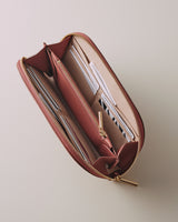 Open wallet with several card slots and compartments.