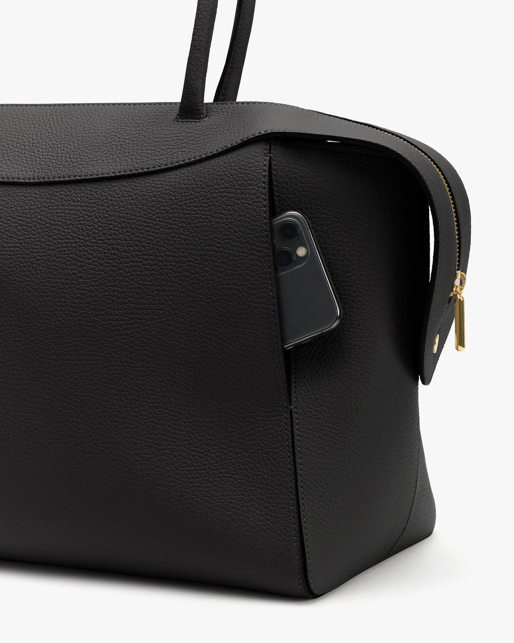 Large travel bag with phone in side pocket and two handles.