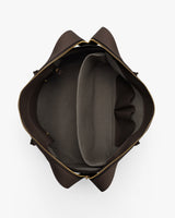 Open travel bag with multiple compartments and a zipper closure.