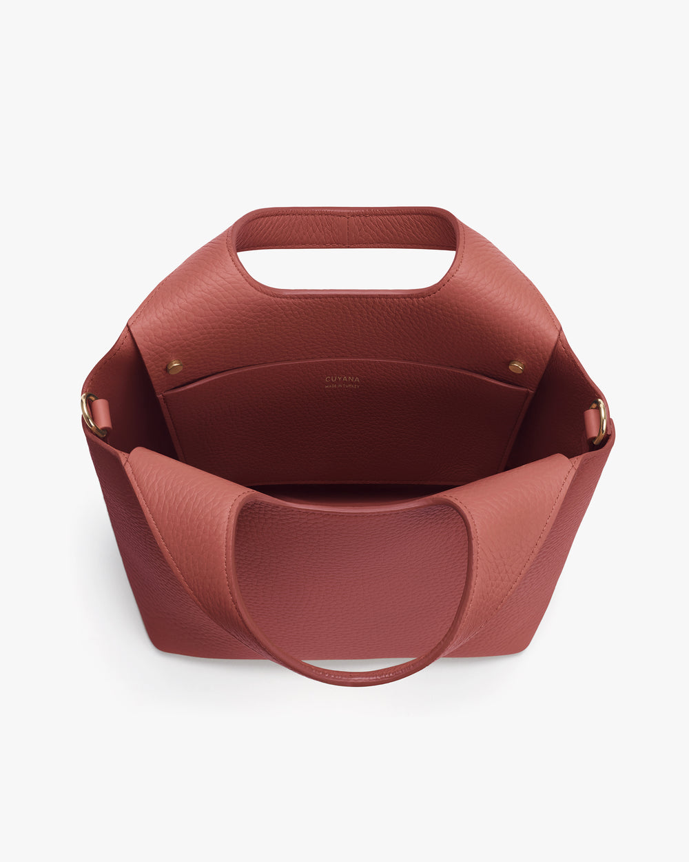 Open tote bag with cut-out handle and visible interior pockets.