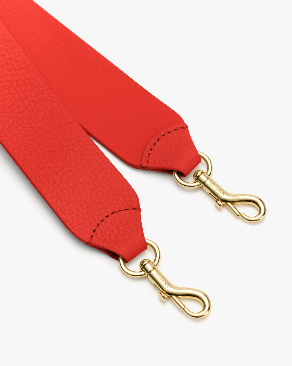 Bag strap with metal clasps.