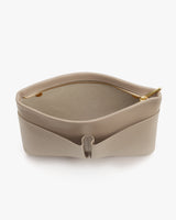 Open pouch with zipper and divided compartments.