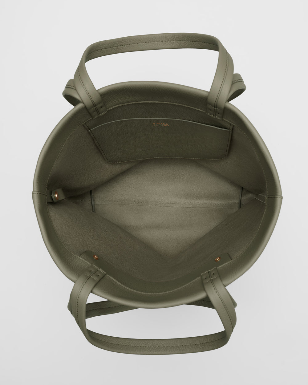 Open tote bag with double handles, viewed from above, showing interior compartments.