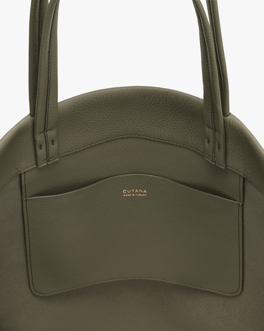 Round handbag with two long handles and a front pocket.