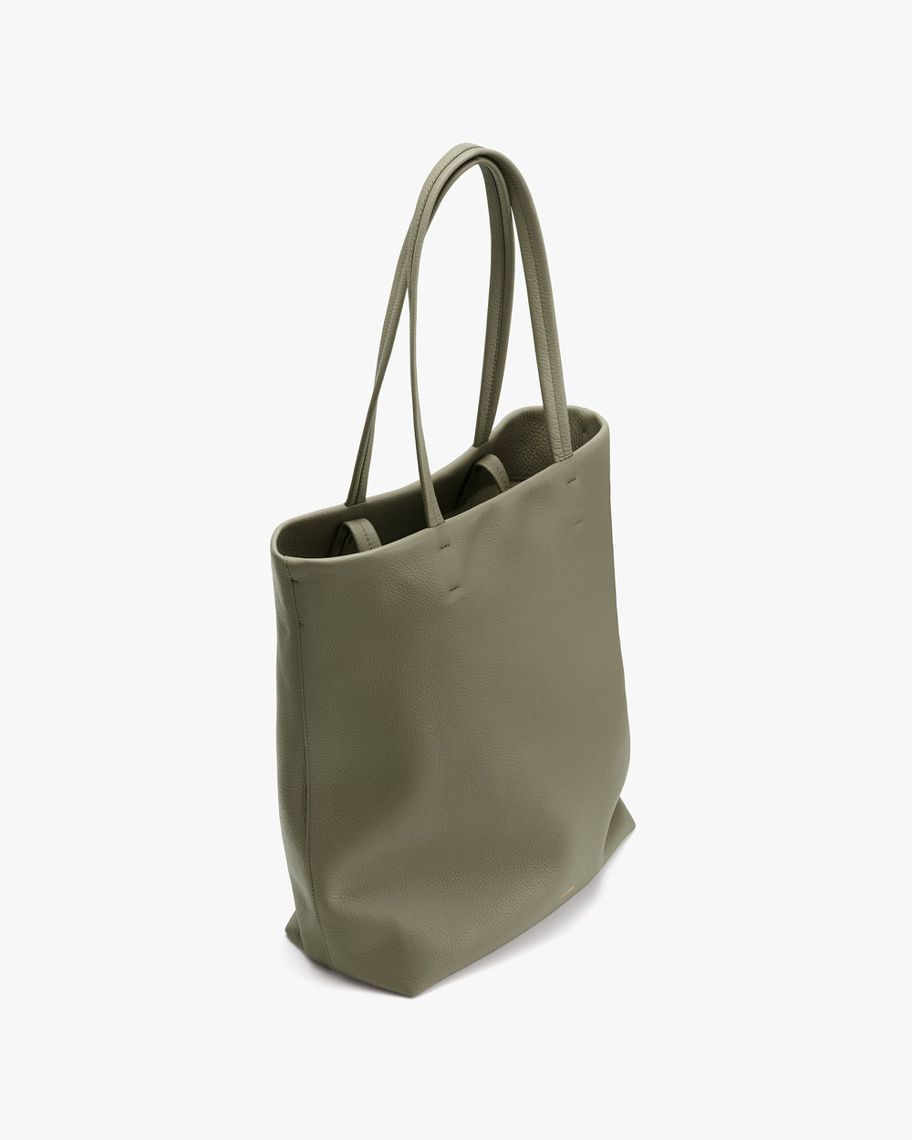 Tote bag with thin handles shown from a side angle.