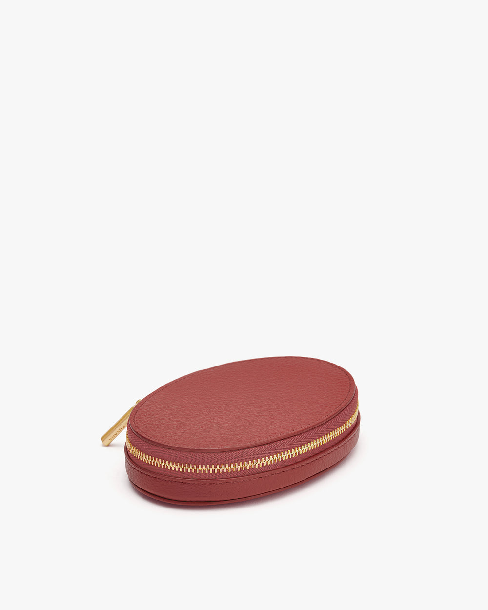 Oval zippered case on a plain background.