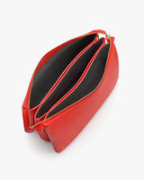 Open travel bag with compartments and zippered sections