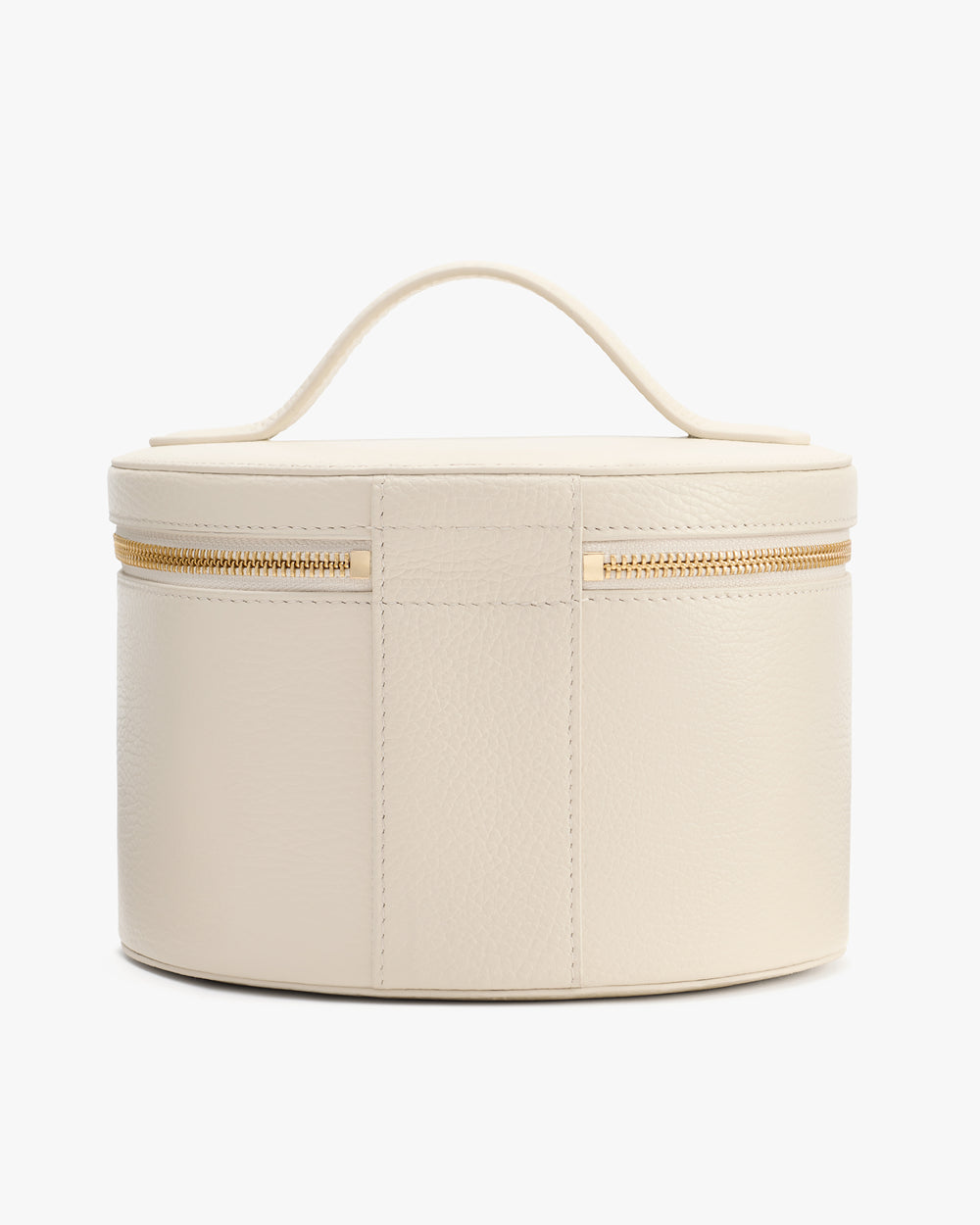 Round cosmetic case with handle and zipper closure.