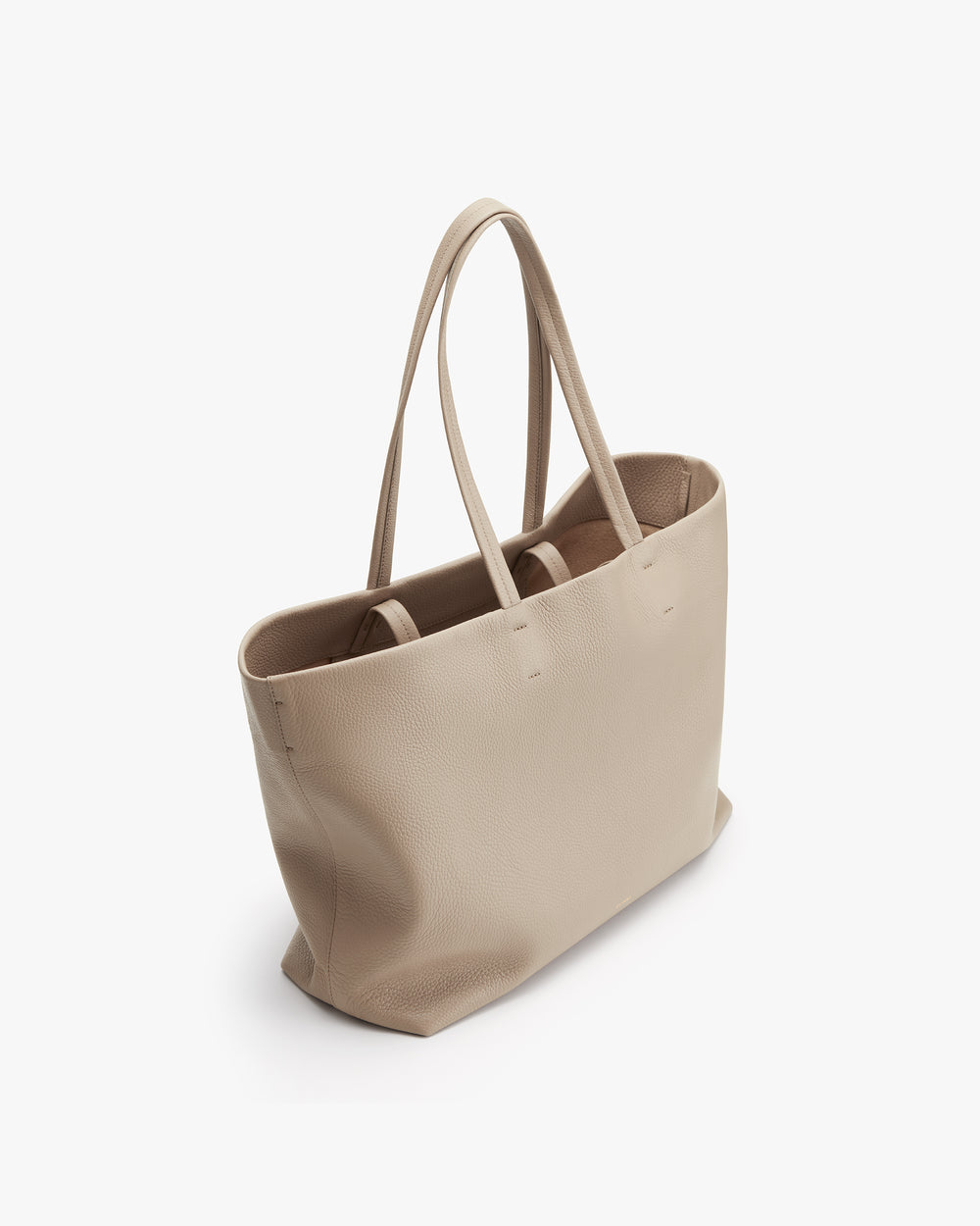 Tote bag with two handles on a plain background.
