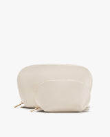 Two zippered pouches, one larger and one smaller, placed together.