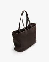 Tote bag with two handles on a plain background.