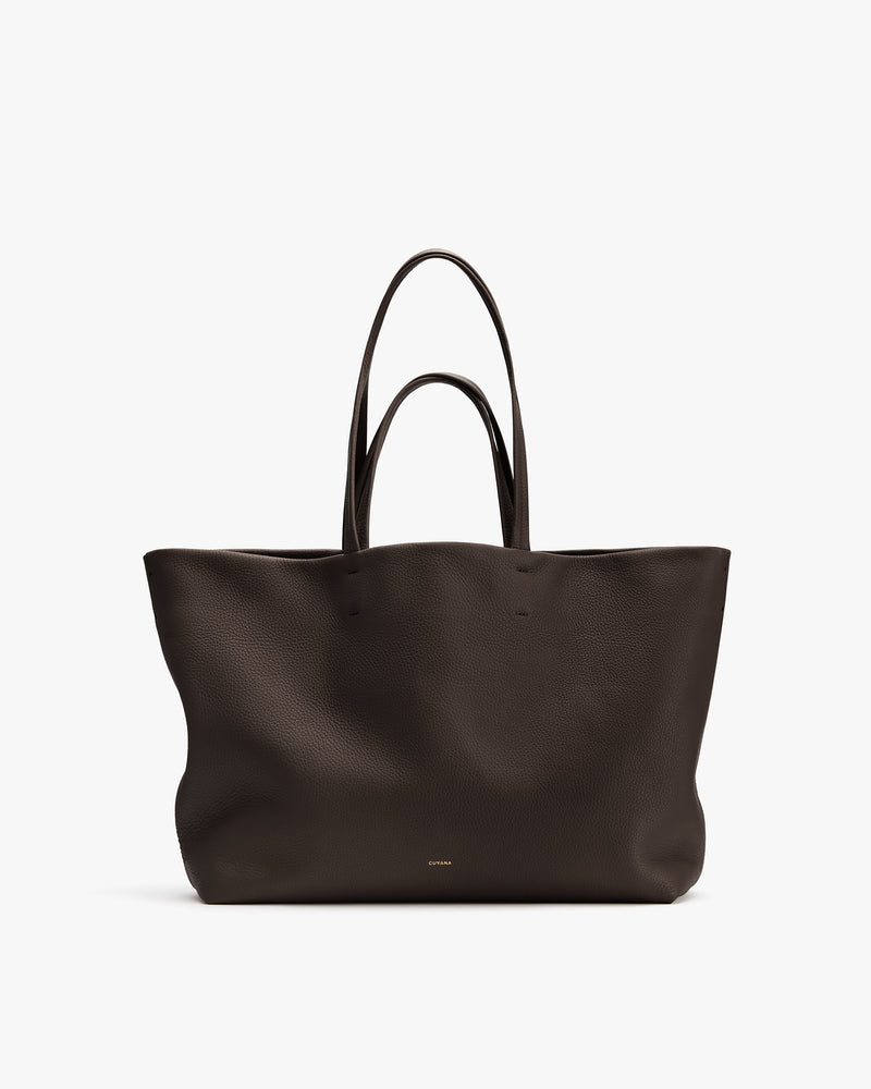 Large tote bag with two handles.