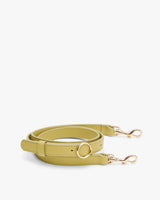 Leather bag strap with metal clasps and adjustable buckle.
