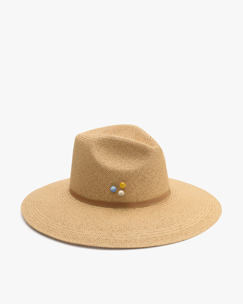 Wide-brimmed hat with small round decorations on the side.