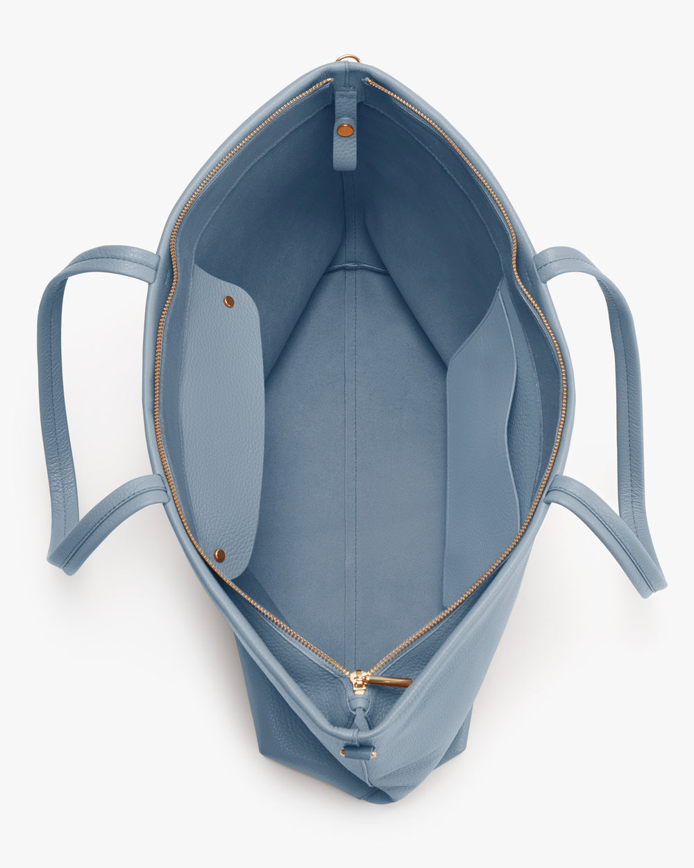 Open tote bag with two internal pockets and zip closure.