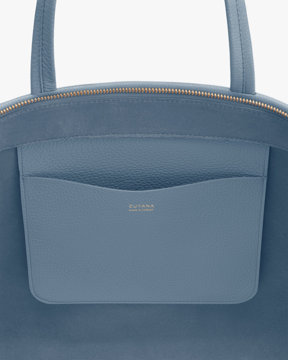 Close-up of a travel bag with a small outer pocket.